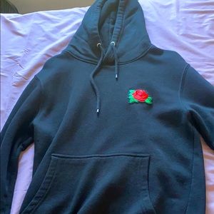 black hoodie with red rose